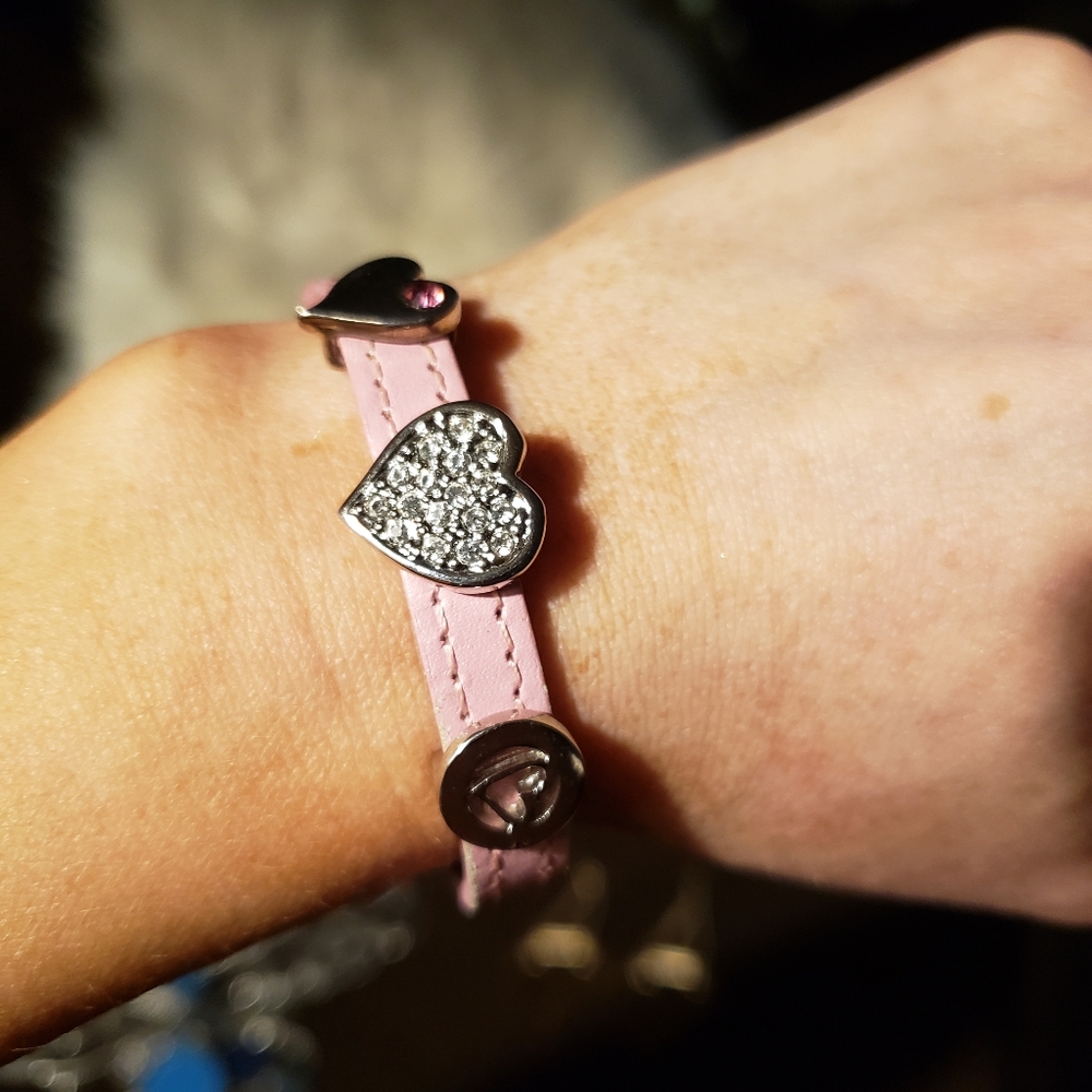 Pink strap bracelet with silver embellishments